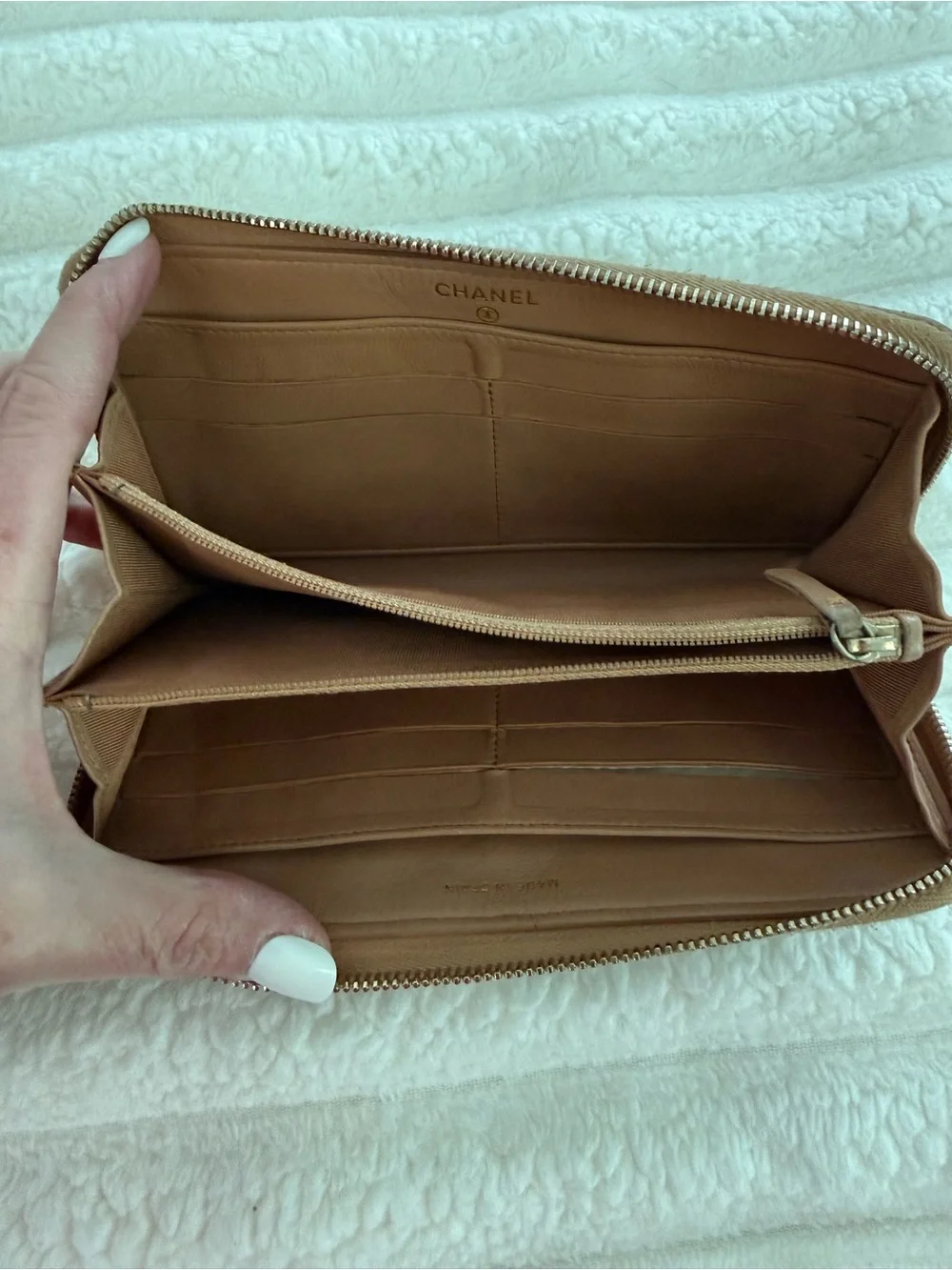 CHANEL Quilted Leather Zip Wallet in Brown with Gold CC